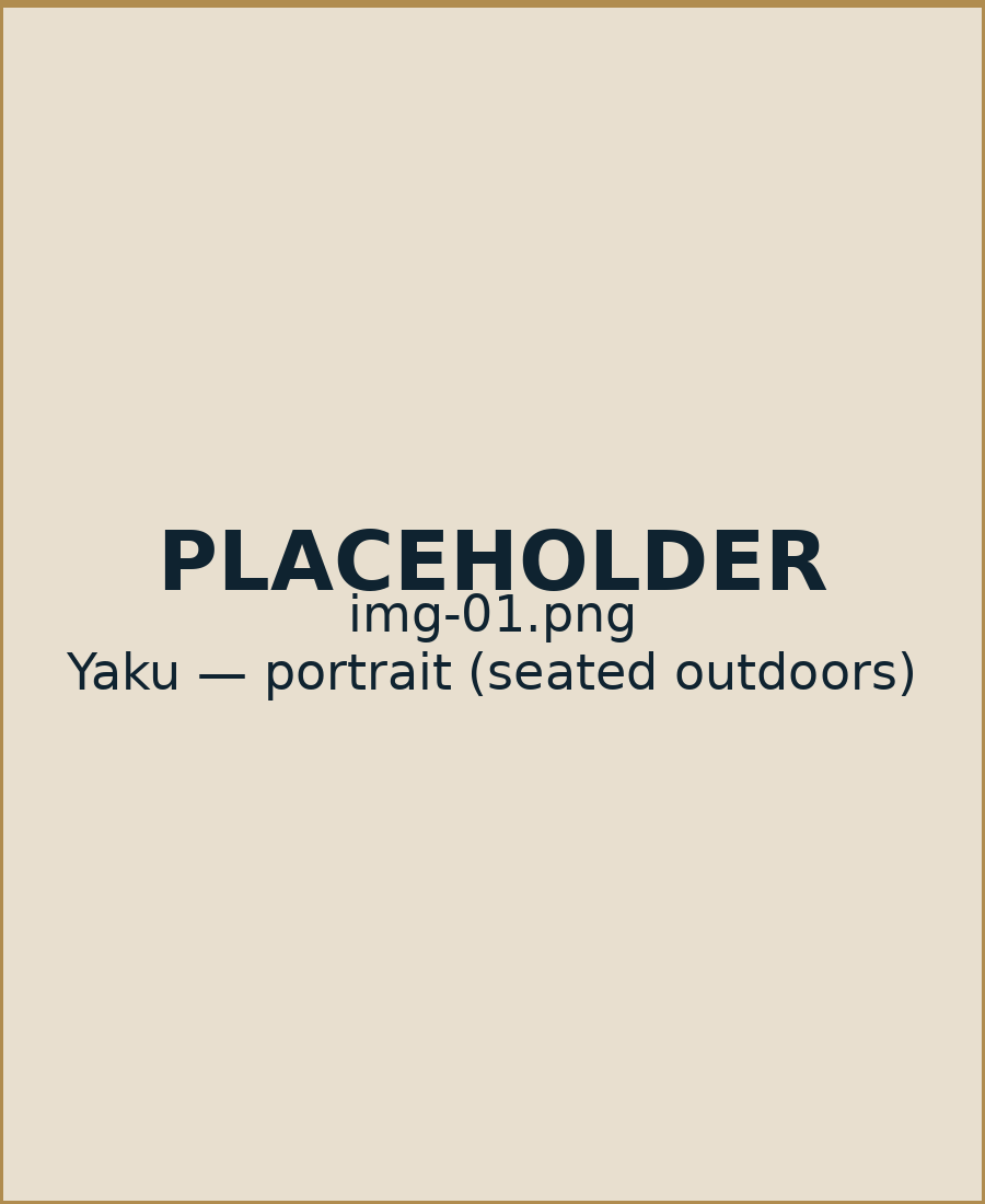 Yaku, seated outdoors with a notebook